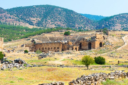 Ruins and old buildings in Hierapolis ancient city adjacent to modern Pamukkale in Turkeyの写真素材