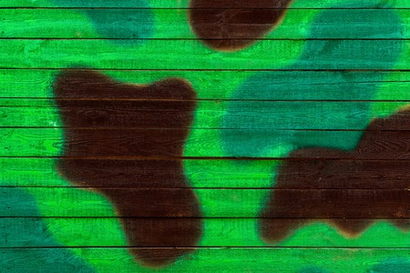 Texture of a wooden wall or a military khaki boxの写真素材