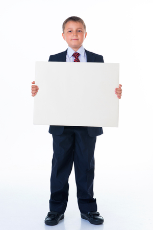 close up of man hands showing white blank board.の写真素材