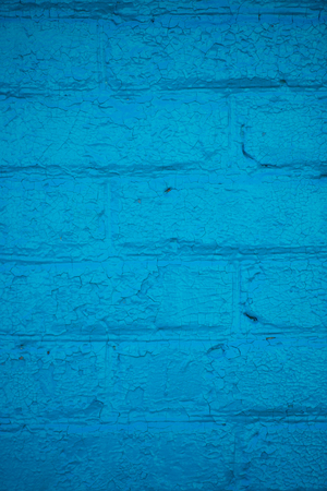 blue brick wall background. Texture of painted brickの写真素材
