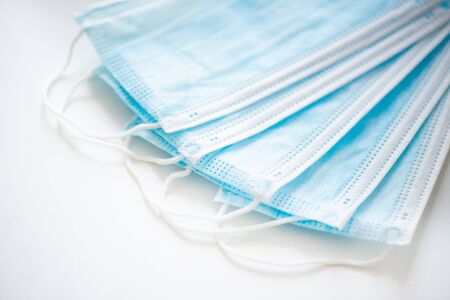 Close-up of a surgical medical mask isolated on a white background. The concept of protection...