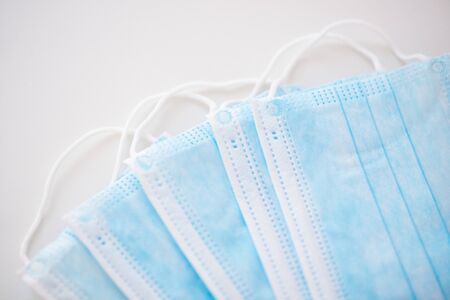 Close-up of a surgical medical mask isolated on a white background. The concept of protection...