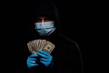 Concept of the global financial crisis. World pandemic virus COVID-19 coronavirus. Panic, black and...