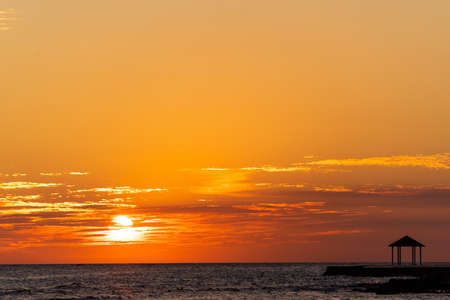 Incredibly beautiful best orange sunset or sunrise on the Caribbean Sea in the Dominican Republic. Sea, sky with clouds and horizon. high quality photoの写真素材