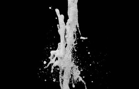 water splash isolated on the black backgroundの写真素材