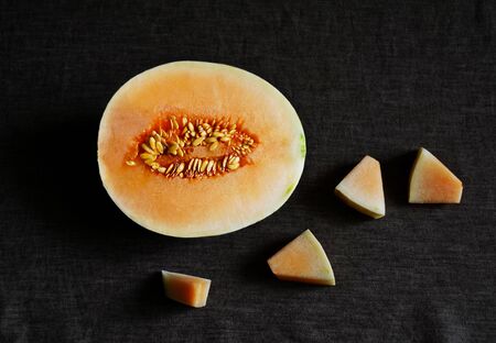 Cantaloupe Melon on clothing background, fruit healthy food, space for