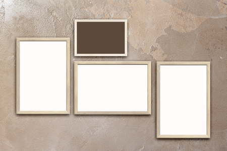 Mock up of blank posters in wooden frames on texturized brown stucco wallの写真素材