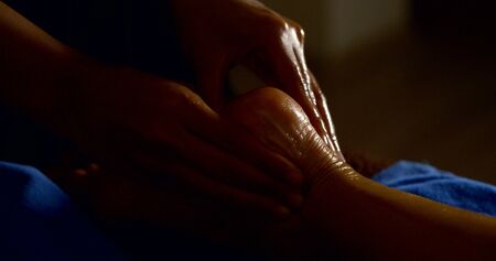 Massage whole foot, heel closeup.の写真素材