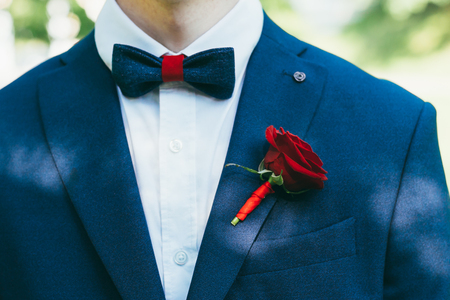 Beautiful boutonniere for men outdoor in the streetの写真素材