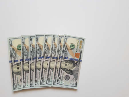 Money, a dollar laid out one on one. Background with copyspace