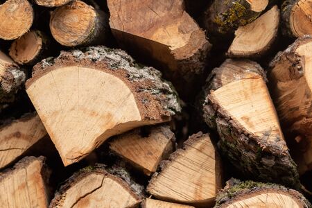Background of chopped wood lying on top of each other