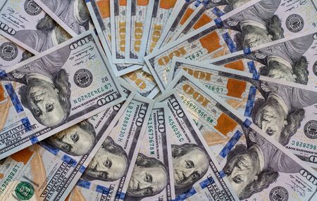 Background of hundred-dollar bills, texture of dollars