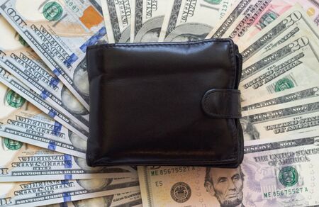 Background of dollar bills with a wallet, texture of dollar bills