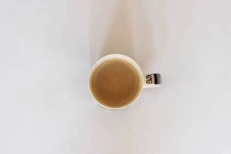 Coffee Cup isolated on a white background. Coffee porridge on a white background. Top view of a coffee cupの写真素材