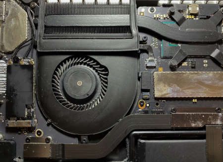 Open back cover of the laptop for repair and cleaningの写真素材