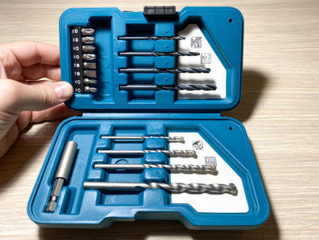 A set of bits and drills for wood, metal and brick in a beautiful box