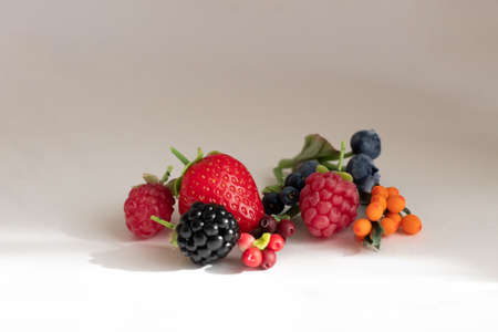 Miniature figures of strawberries, blackberries, raspberries, blueberries, blueberries, cranberries...