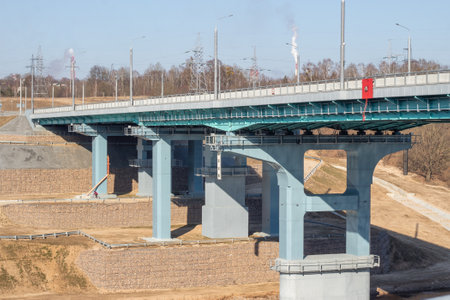 A road bridge over the river. Structures of the automobile bridge from belowの写真素材