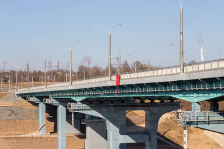 A road bridge over the river. Structures of the automobile bridge from belowの写真素材