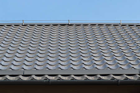 The roof of the house made of tiles