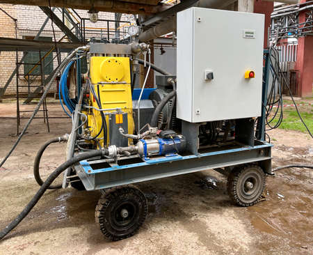 Poznan, Poland - 04.28.2022: Hammelmann high pressure hydraulic unit. High pressure pump for heat...