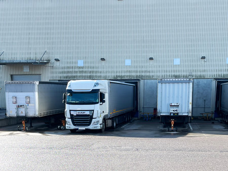Germany - 03.20.2023: DAF XF truck is loading or unloading under the rampのeditorial素材