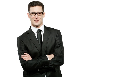 Young handsome businessman in black suit on white.