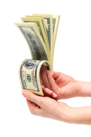 Counting dollar bills. Joy earned money.の写真素材