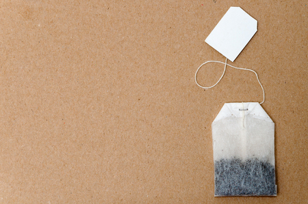 Bag of tea on textured backgroundの写真素材