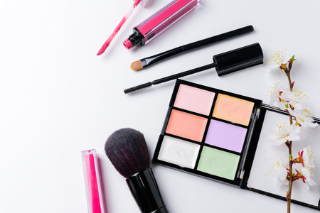 Female cosmetology makeup accessories copy space on white background. Spring beauty concept.の写真素材