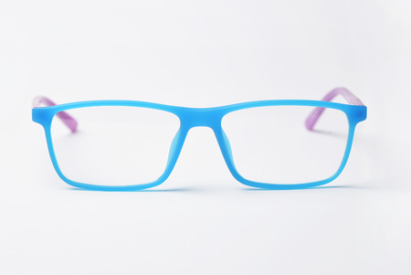 Child's plastic frame for glasses. Mock up for the design of optics store and shop, eye clinic. Glasses for reading and distance, correction of sight. Beautiful eyeglasses rim.の写真素材