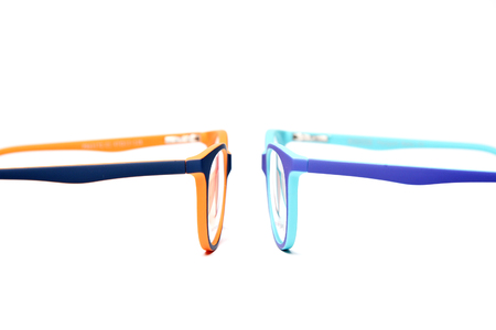 Stylish, trendy, modern kids eyeglasses rim on white background in studio.の写真素材