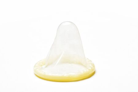 Contraceptive latex condom on white background close upの写真素材