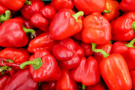 Group organic vegetable red sweet pepper, above view. Texture wallpaper of fresh sweet pepper.の写真素材