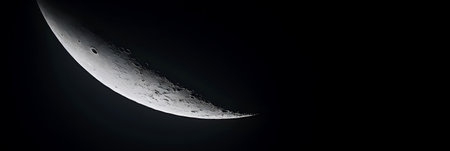Closeup of half moon grey surface on black background in cosmos space, panoramic viewの素材
