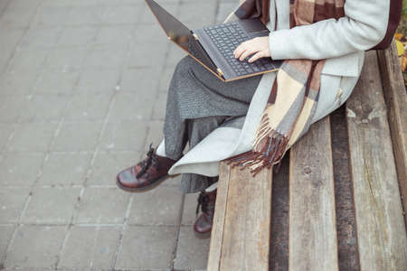 Ypung lady working in cafe and walking in cityの写真素材