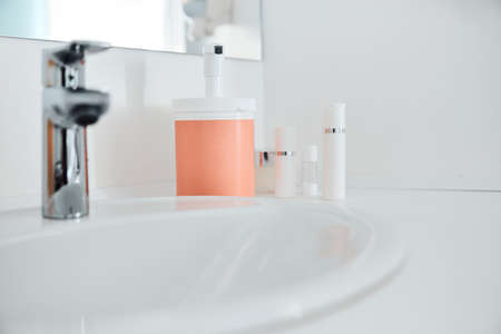 Beautiful healthy smiling caucasian woman is doing beauty procedures at spa and healthcare salonの写真素材