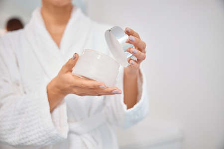 Beautiful healthy smiling caucasian woman is doing beauty procedures at spa and healthcare salon