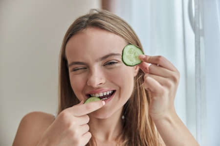 Young healthy natural skin female at home at the morningの写真素材