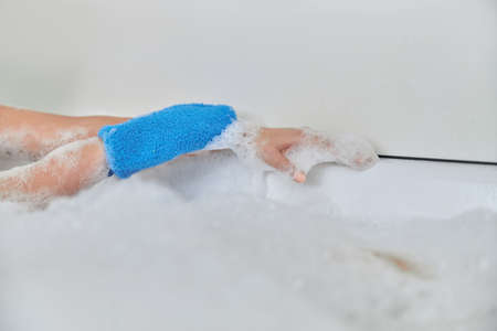 Young female with natural healthy fresh skin at home bathroom