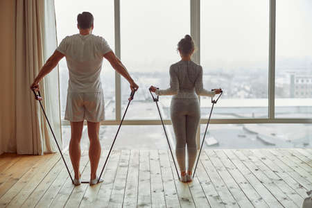 Fit spouces doing training together during quarantine