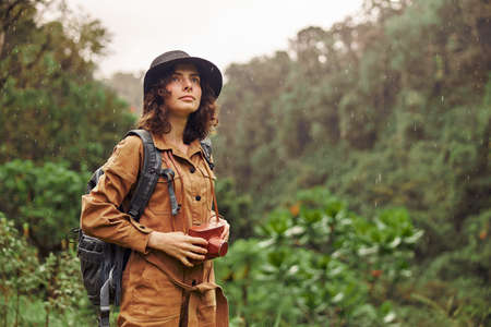 Beautiful young female caucasian tourist in equatorial africa junglesの写真素材