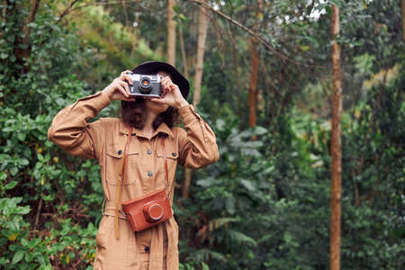 Beautiful young female caucasian tourist in equatorial africa junglesの写真素材