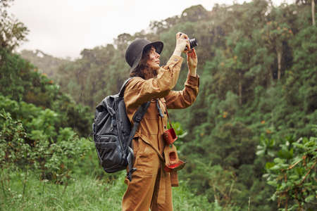 Beautiful young female caucasian tourist in equatorial africa junglesの写真素材