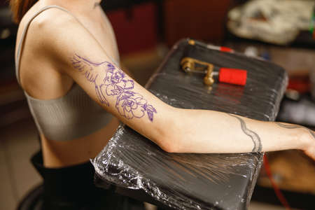 Photo of woman hand with pattern on skinの写真素材