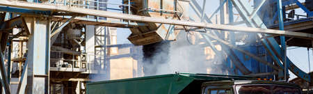 Production plant with industrial facilities and vehicle