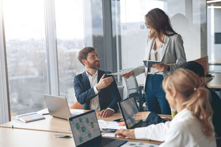Diverse colleague brainstorming in a meeting at modern office