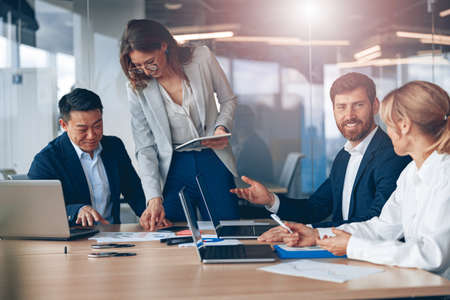 A group of business people partners during a set team meeting in the modern office