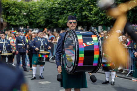 Dublin, Ireland, June 25th 2022. Ireland pride 2022 parade with people walking on one of the main city streetのeditorial素材