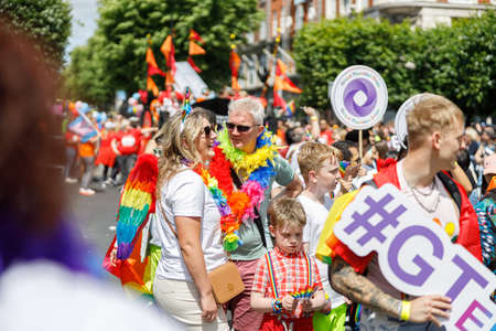 Dublin, Ireland, June 25th 2022. Ireland pride 2022 parade with people walking on one of the main city streetのeditorial素材